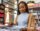 Young woman shopping for records